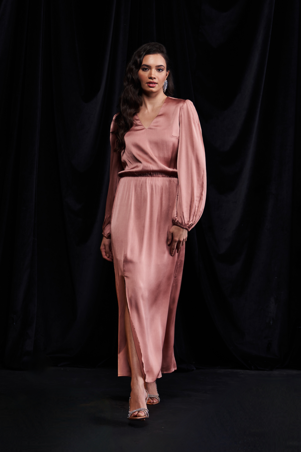 LEILA ROSE GOLD COLOR WAVE SATIN FABRIC LONG LENGTH V-NECK PARTY DRESS WITH ONE SIDE SLIT AND LONG SLEEVES