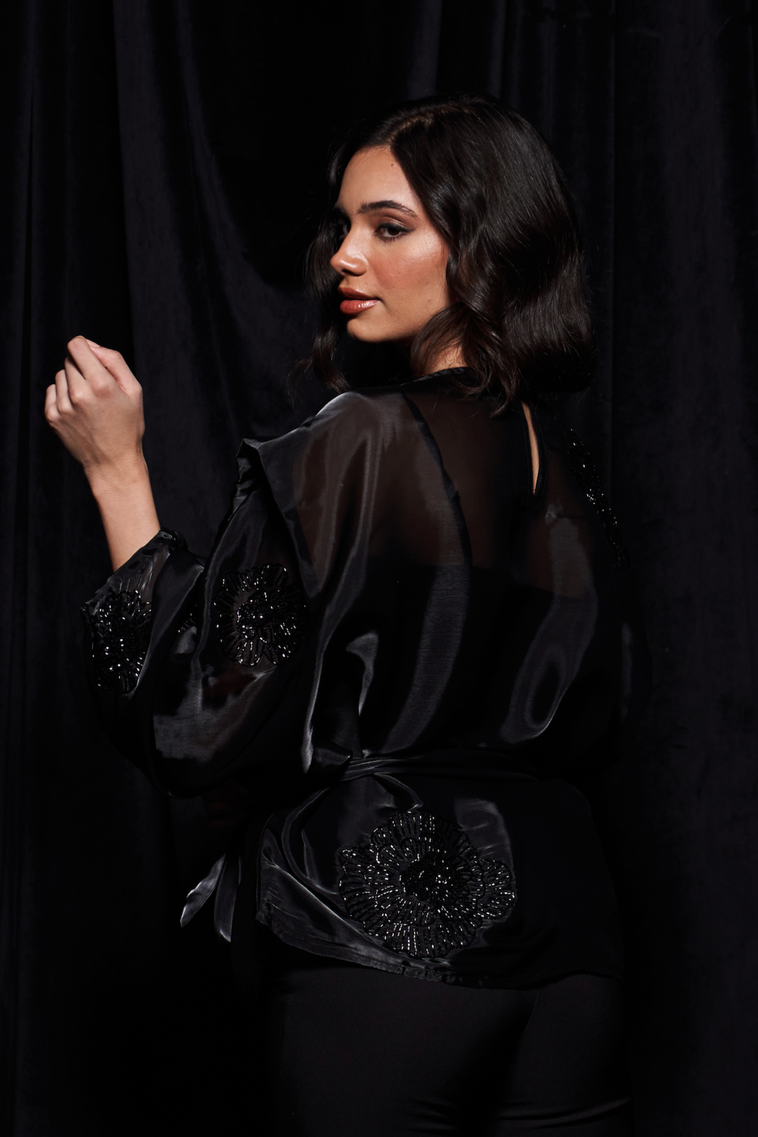 LEILA BLACK COLOR FLUID ORGANZA TOP WITH GLISTENING BLACK GLASS BEADS EMBROIDERY WORK AND WAIST SASH