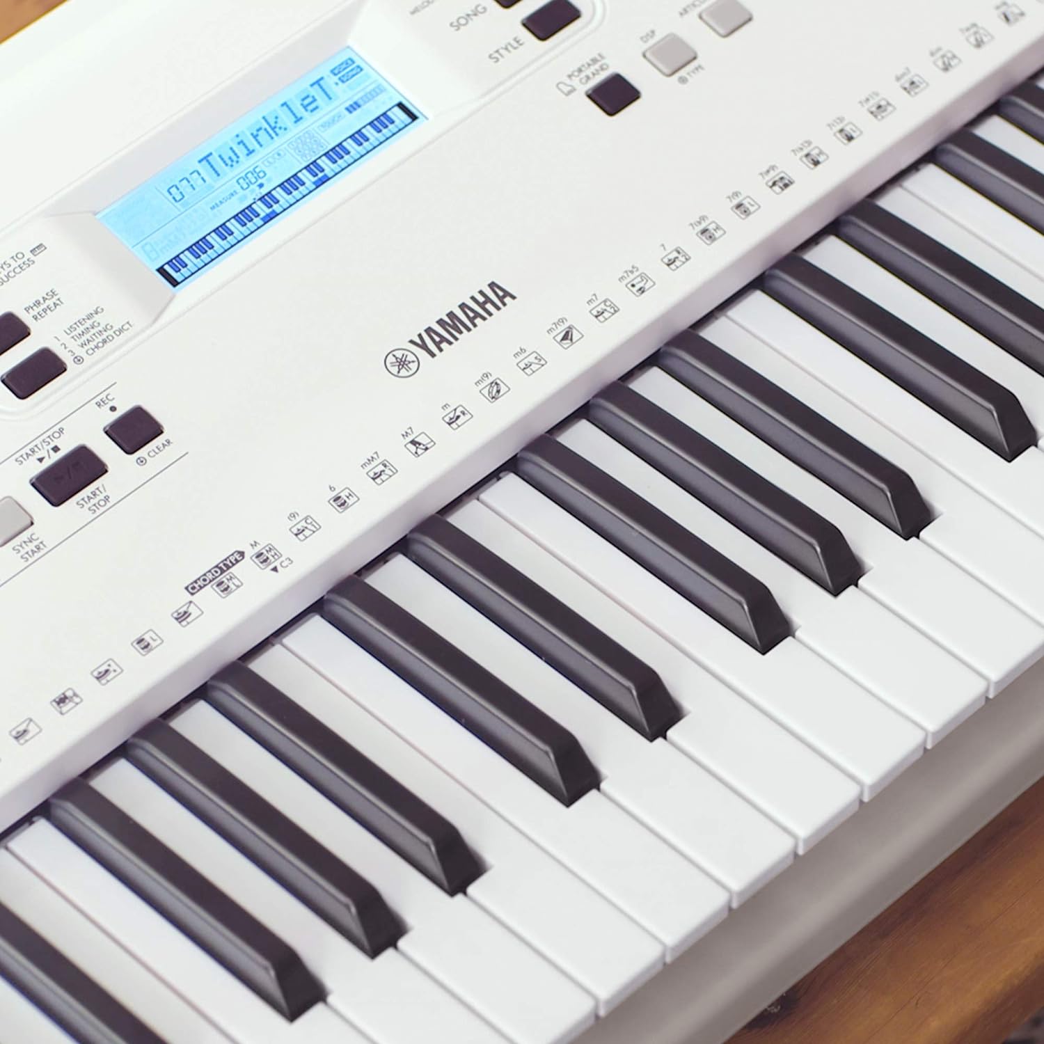 Yamaha EZ-300 61-Key Portable Keyboard with Lighted Keys Bag Stand And Dust Cover Combo Pack
