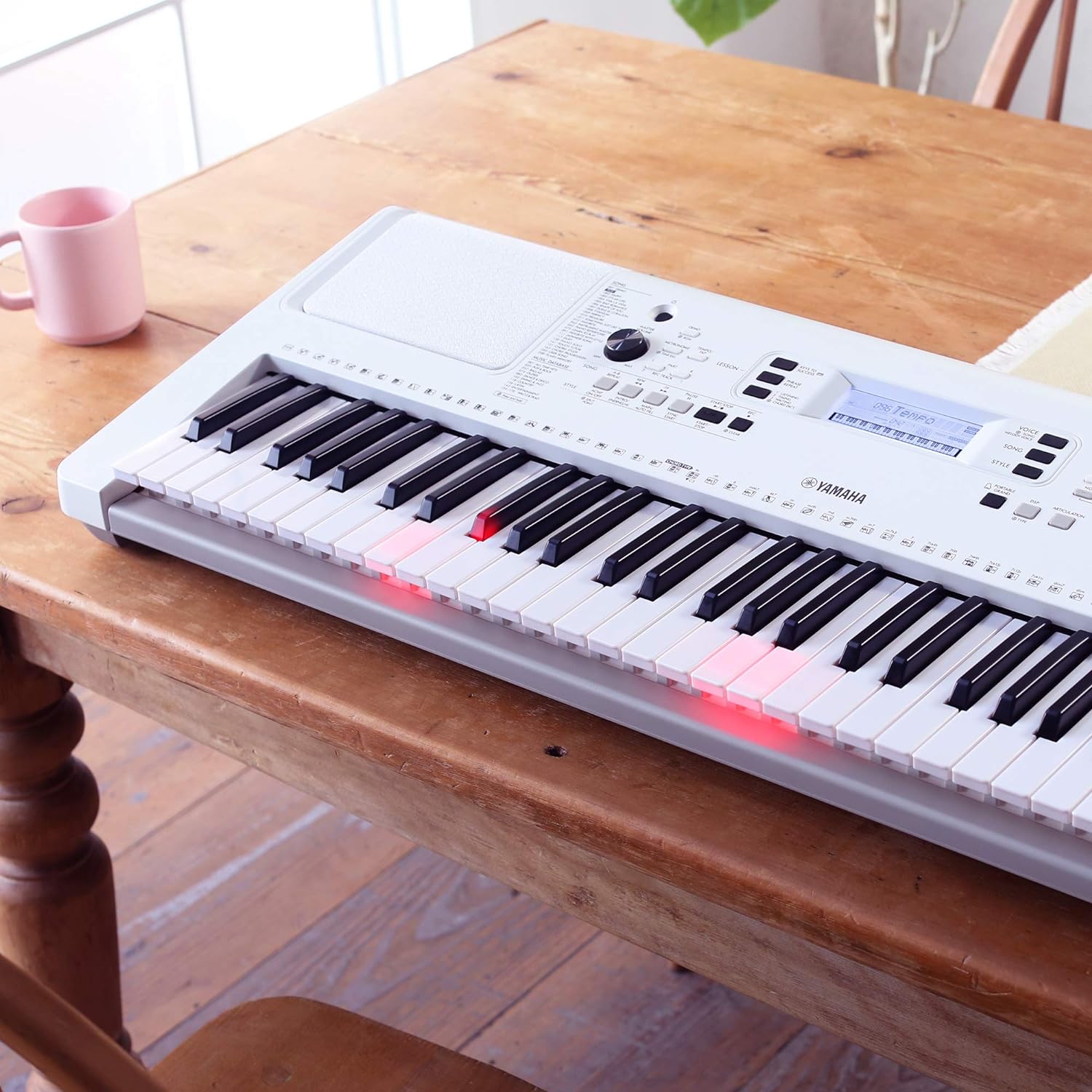 Yamaha EZ-300 61-Key Portable Keyboard with Lighted Keys Bag Stand And Dust Cover Combo Pack