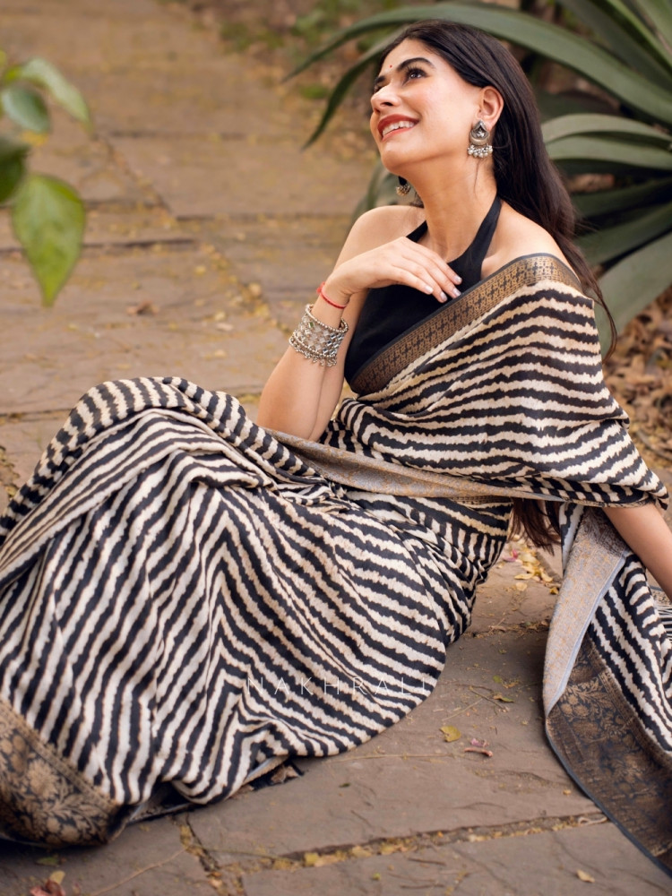 Raaya Black Flowy Silk Saree with Zari Border