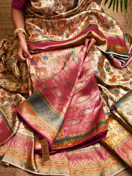 Vantara Peach Zari Weave Saree with Animal Motifs