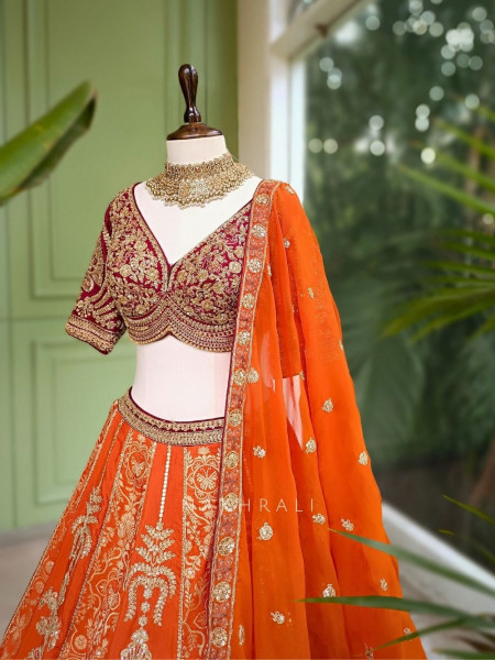 Ishira Orange Embroidered Lehenga with Maroon Blouse