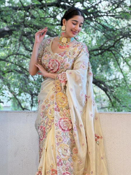 Pushpam Cream Saree with Floral Thread Work and Readymade Blouse