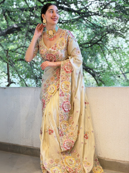 Pushpam Cream Saree with Floral Thread Work and Readymade Blouse