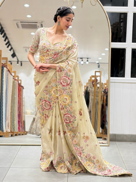 Pushpam Cream Saree with Floral Thread Work and Readymade Blouse