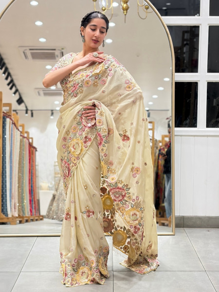 Pushpam Cream Saree with Floral Thread Work and Readymade Blouse