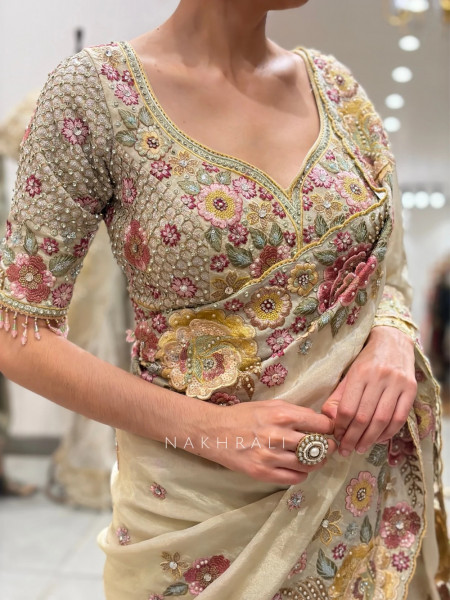 Pushpam Cream Saree with Floral Thread Work and Readymade Blouse