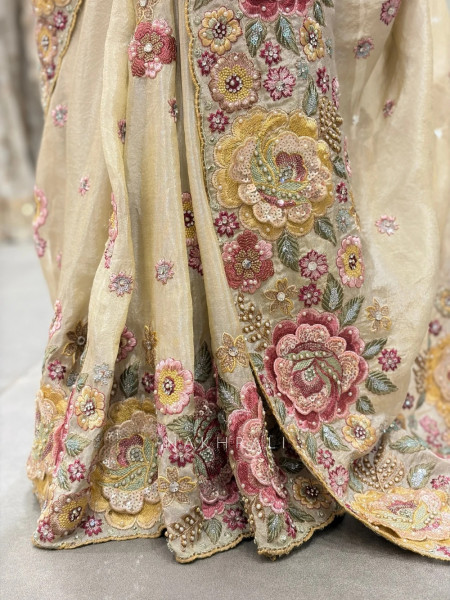 Pushpam Cream Saree with Floral Thread Work and Readymade Blouse