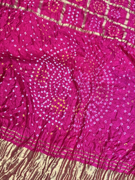 Charvi Magenta Gharchola Bandhej Saree with Traditional Border