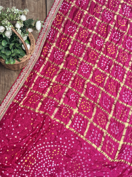 Charvi Magenta Gharchola Bandhej Saree with Traditional Border