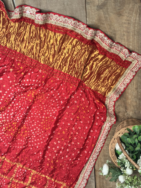 Charvi Red Gharchola Bandhej Saree with Traditional Border