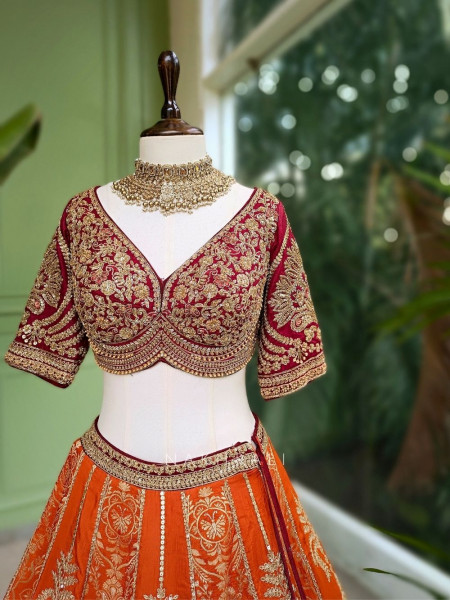 Ishira Orange Embroidered Lehenga with Maroon Blouse