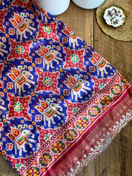 Aarini Blue Patola Print Saree with Mirror Work Border