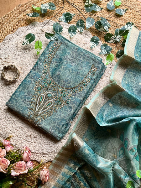 Aarvi Sea Green Elegant Dress Material with Intricate Neck Embroidery