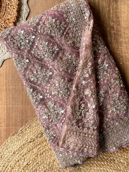 Tarangini Light Purple Net Saree With Cutdana and Sequin Work