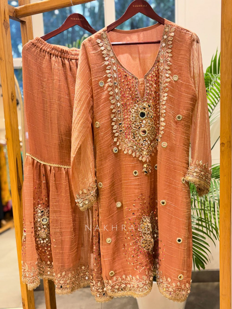 Image of Aisha Peach Tissue Suit Set with Mirror and Gota Patti Work