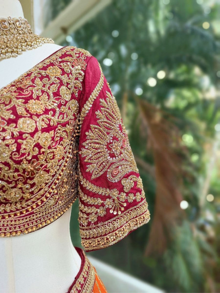 Ishira Orange Embroidered Lehenga with Maroon Blouse