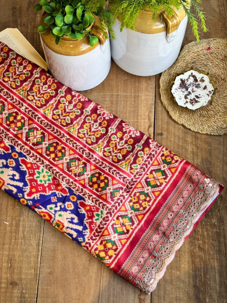 Aarini Blue Patola Print Saree with Mirror Work Border