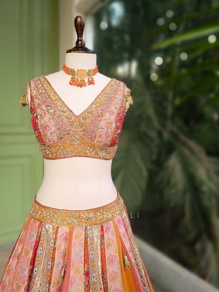 Mayra Orange Silk Lehenga with Peacock Motif Work