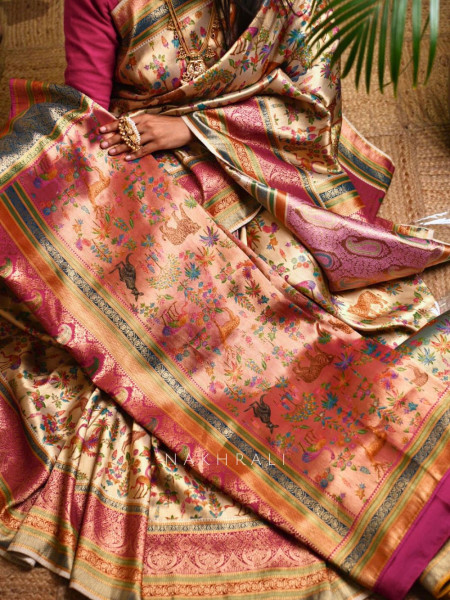 Vantara Peach Zari Weave Saree with Animal Motifs