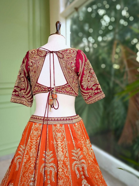 Ishira Orange Embroidered Lehenga with Maroon Blouse