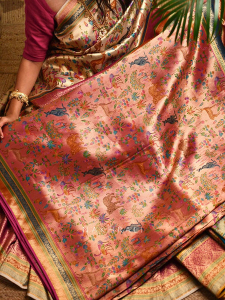 Vantara Peach Zari Weave Saree with Animal Motifs