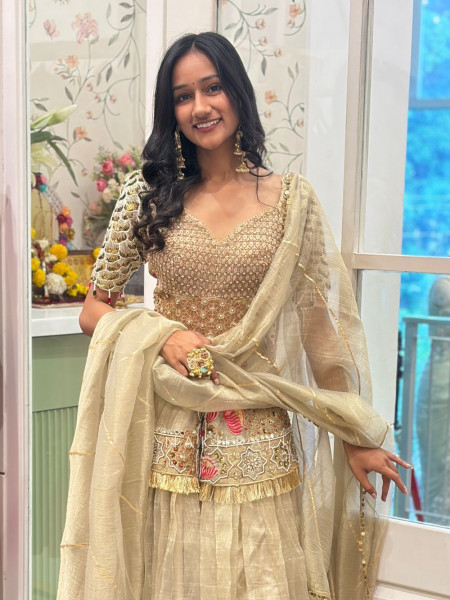 Kanisha Golden Indo-Western Lehenga Set with Embroidered Peplum
