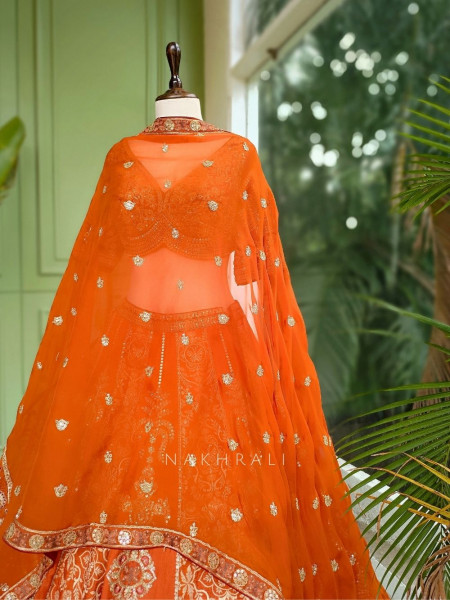 Ishira Orange Embroidered Lehenga with Maroon Blouse