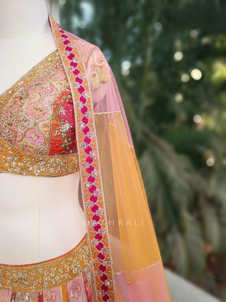 Mayra Orange Silk Lehenga with Peacock Motif Work