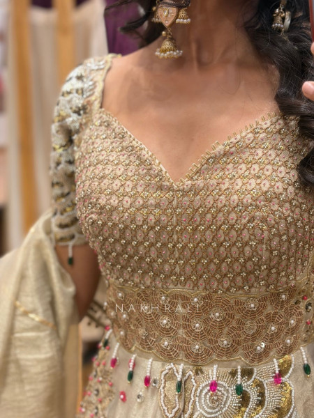 Kanisha Golden Indo-Western Lehenga Set with Embroidered Peplum