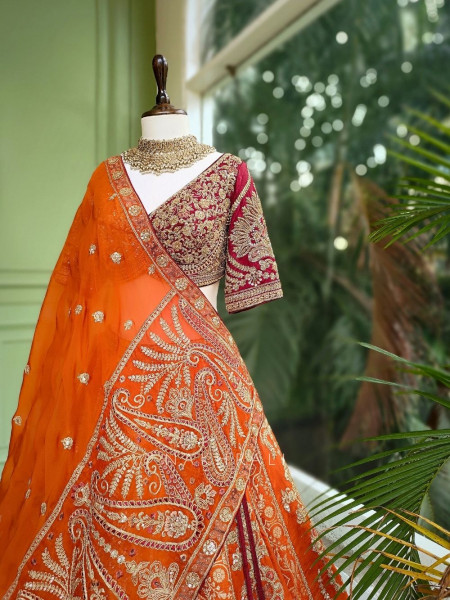 Ishira Orange Embroidered Lehenga with Maroon Blouse