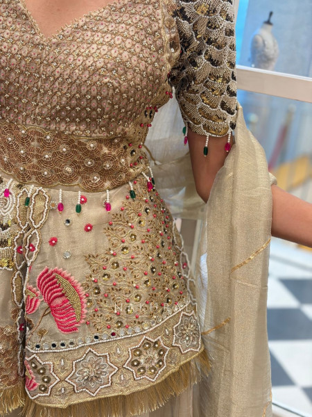 Kanisha Golden Indo-Western Lehenga Set with Embroidered Peplum