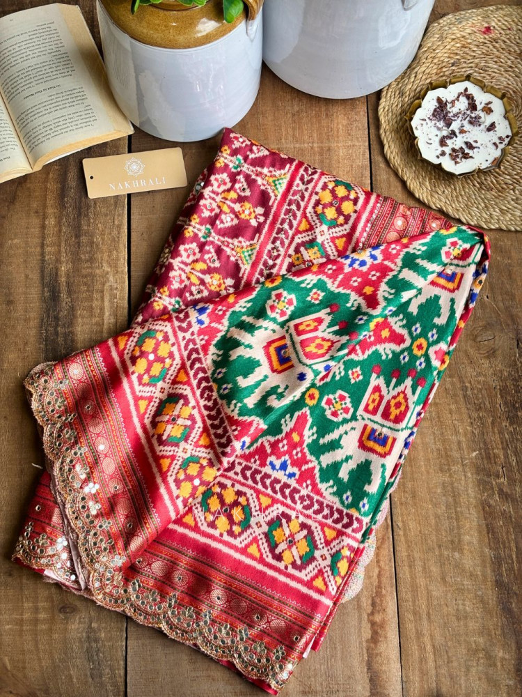 Image of Aarini Green Patola Print Saree with Mirror Work Border