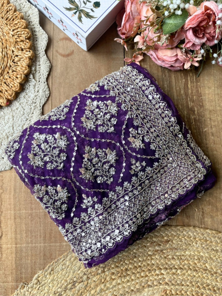Tarangini Purple Net Saree With Cutdana and Sequin Work