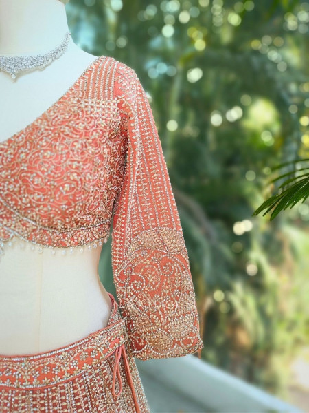 Ruvira Peach Bridal Lehenga with Zari and Sequin Work