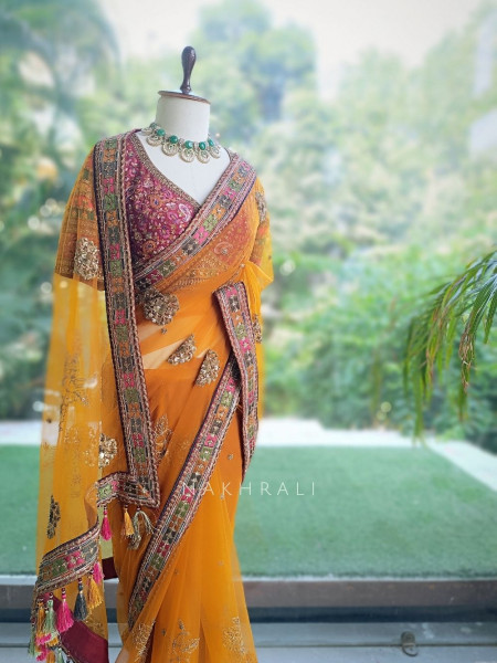 Orange Net Saree with Embroidered Blouse