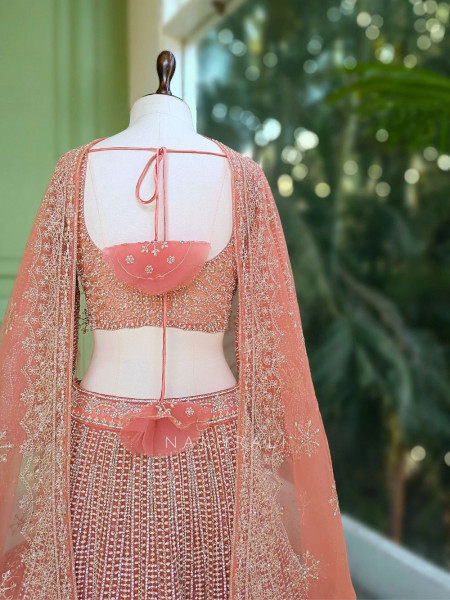 Ruvira Peach Bridal Lehenga with Zari and Sequin Work