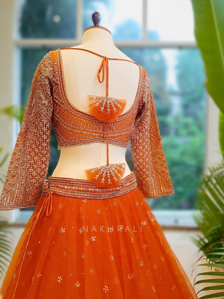 Lustre Enchant Orange Net Lehenga with Heavy Embroidered Blouse