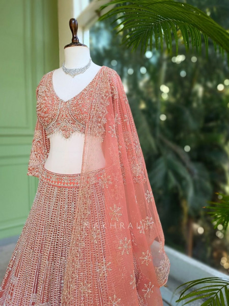 Ruvira Peach Bridal Lehenga with Zari and Sequin Work