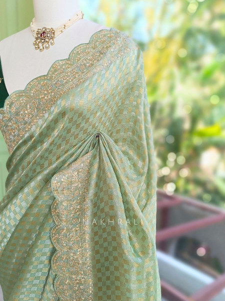 Noor-e-Tarang Pista Green Checks Weaved Saree with Embroidered Border