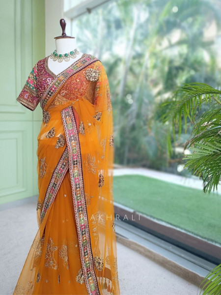 Orange Net Saree with Embroidered Blouse