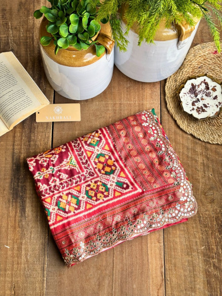 Aarini Green Patola Print Saree with Mirror Work Border