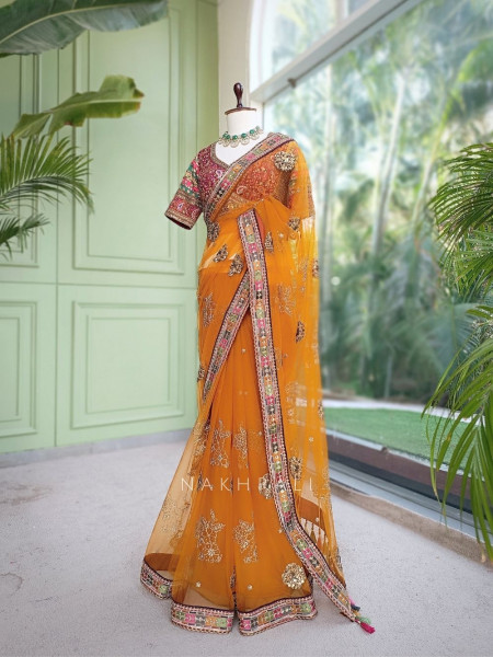 Orange Net Saree with Embroidered Blouse