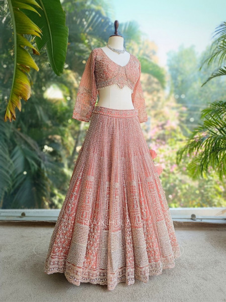 Ruvira Peach Bridal Lehenga with Zari and Sequin Work