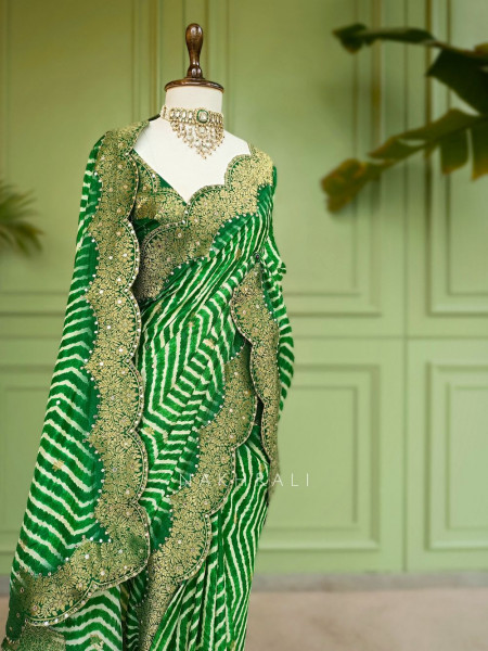 Prathmika Green Pure Georgette Saree  Leheriya Gota Patti Work