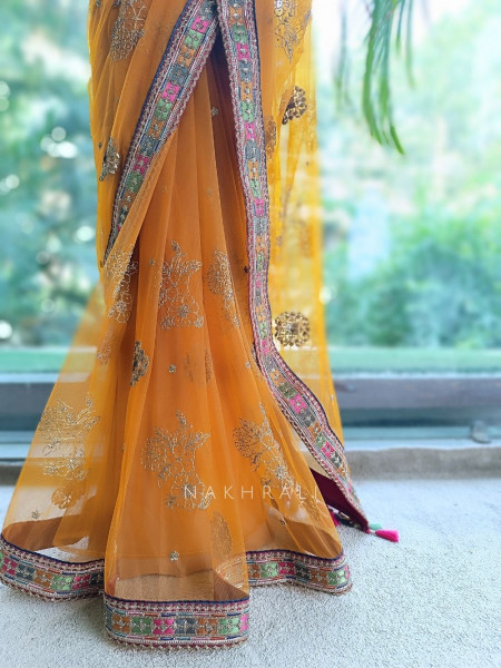 Orange Net Saree with Embroidered Blouse