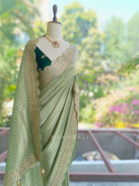 Noor-e-Tarang Pista Green Checks Weaved Saree with Embroidered Border
