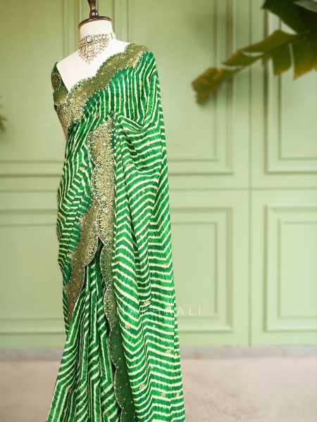 Prathmika Green Pure Georgette Saree  Leheriya Gota Patti Work
