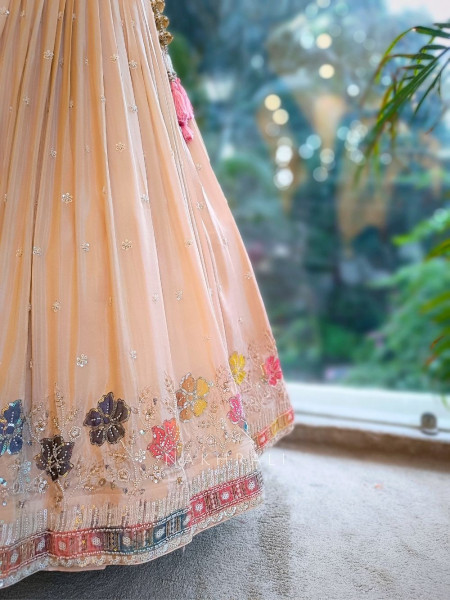 Elara Peach Embroidered Net Lehenga